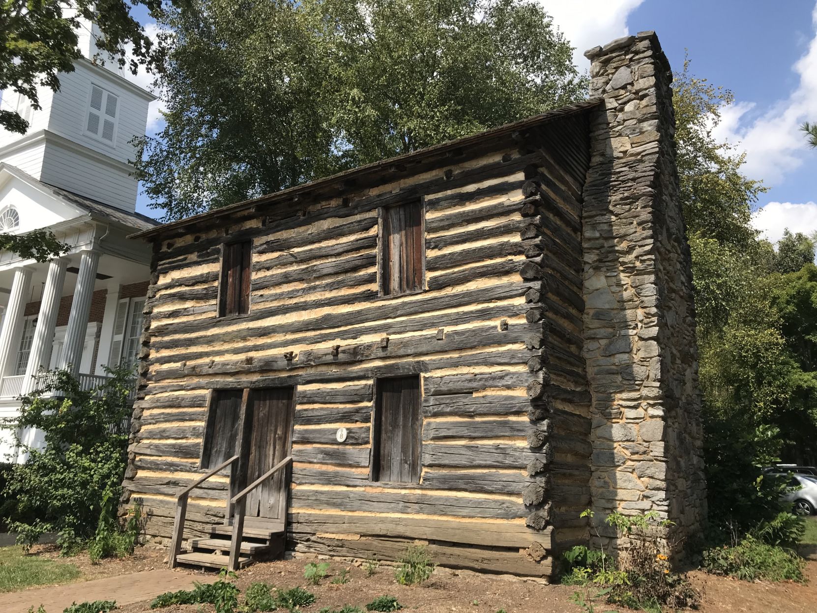 BHC 09292019 jt STORY4 CHRISTOPER TAYLOR LOG CABIN